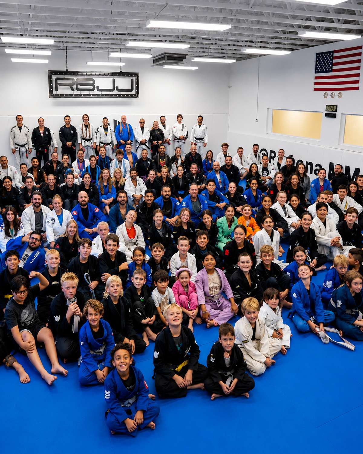 Multigenerational martial arts community at Ramona MMA Center — parents and kids training together