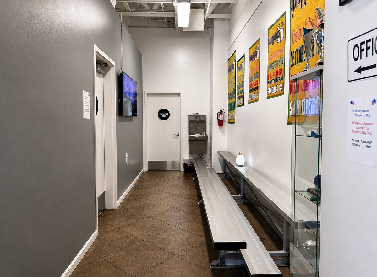 Parent lounge with TVs at Ramona MMA Center for class viewing
